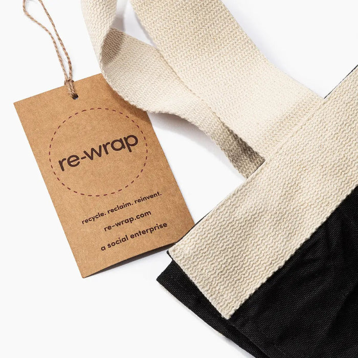 re-wrap X Meriton Suites Tea Towel by The re-wrap Association. Shop Meriton Suites